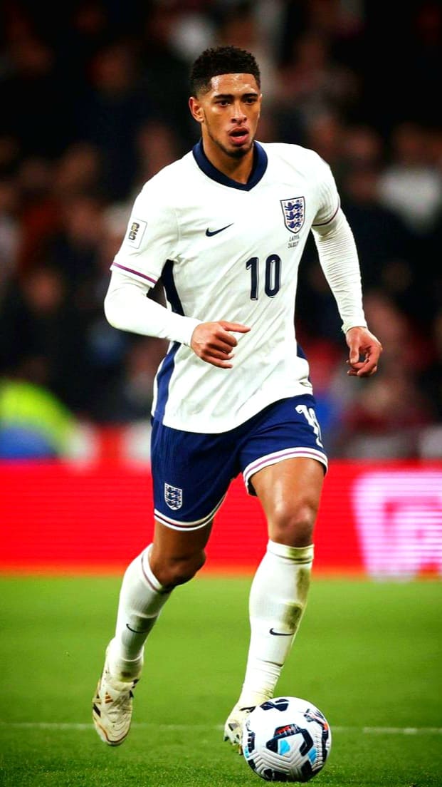 A soccer player in a white England jersey with number 10 is dribbling a ball on the field during a match, as seen through Croatia IPTV. The background shows a blurred crowd and stadium lights.